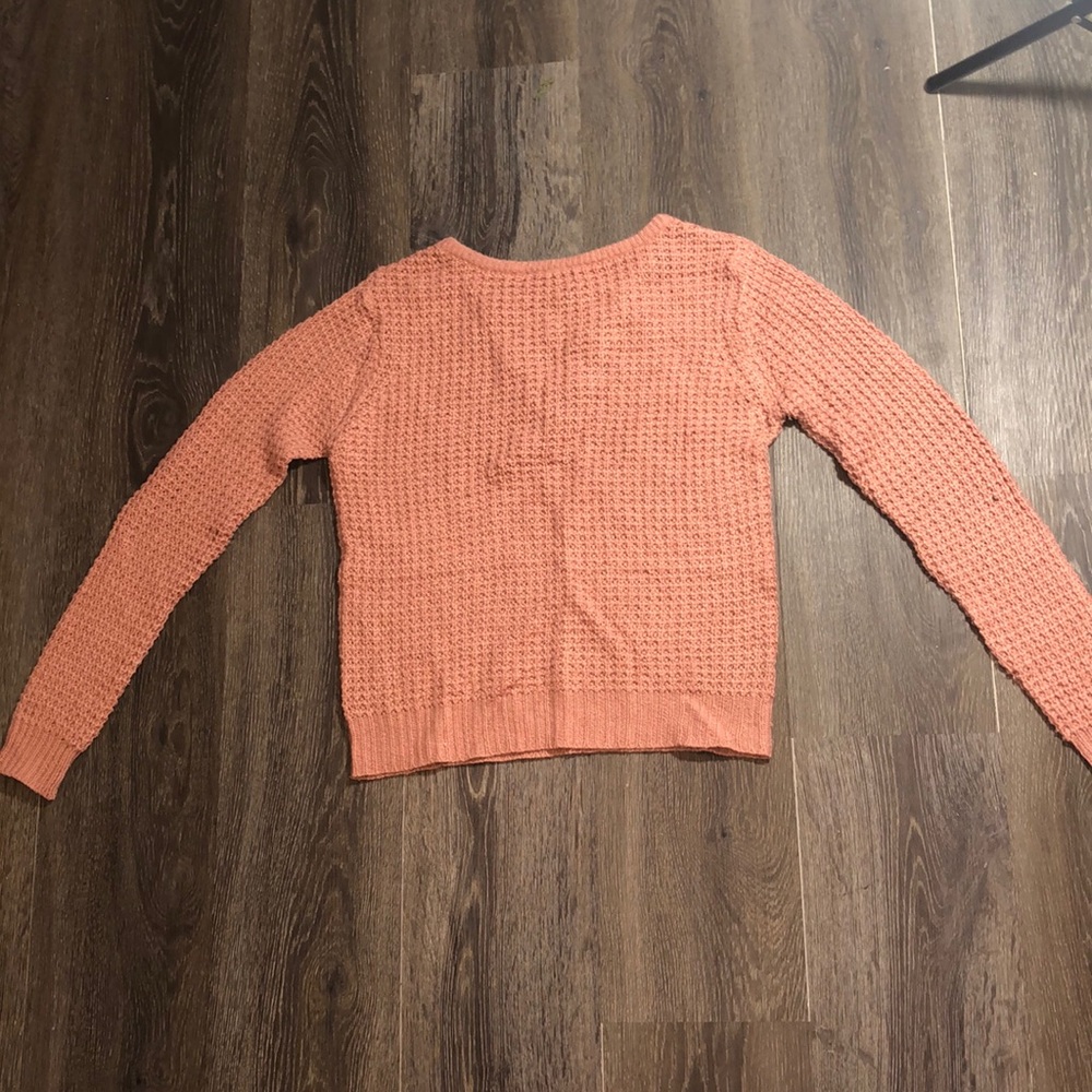 Gently worn pink sweater